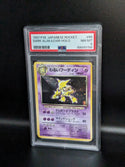 1997 POKEMON JAPANESE ROCKET 65 DARK ALAKAZAM-HOLO PSA